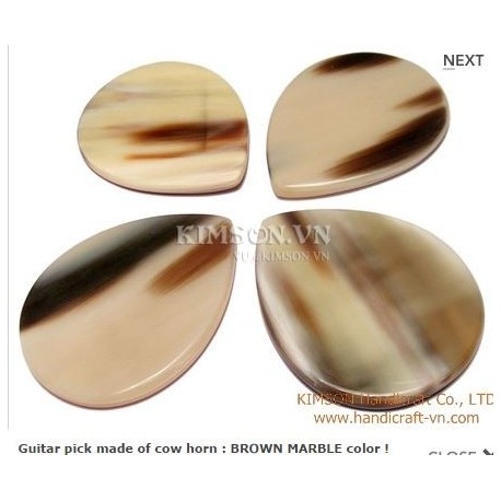 Guitar pic accessories handmade from marble horn